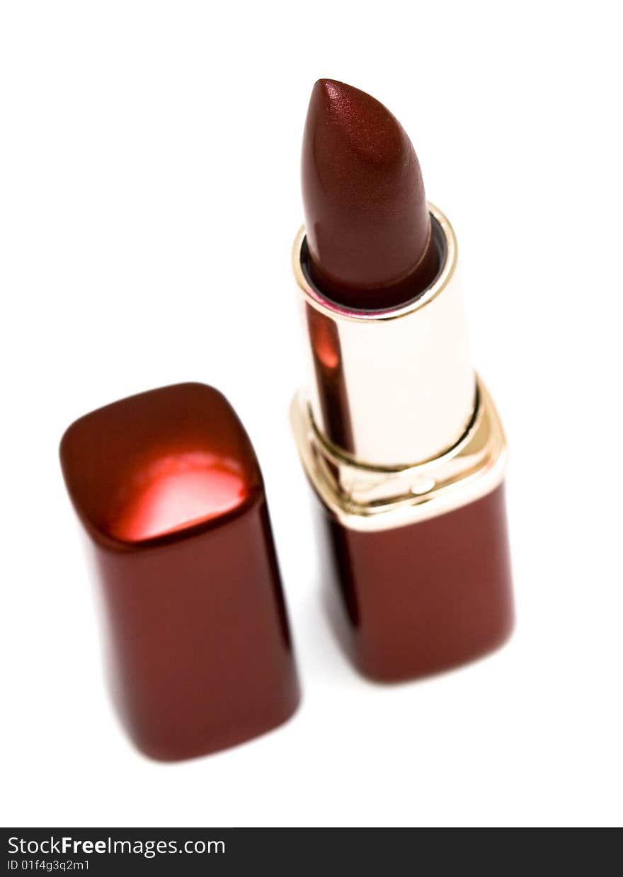 Red lipstick on white background