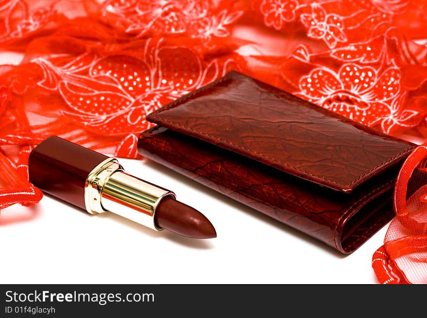 Womanish lipstick, wallet and scarf