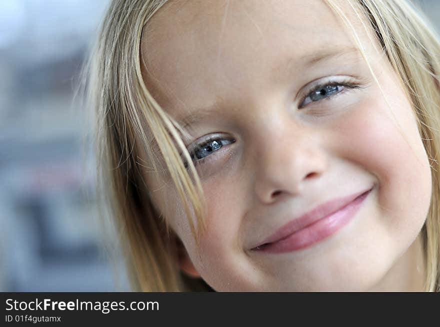 A cute little girl smiling