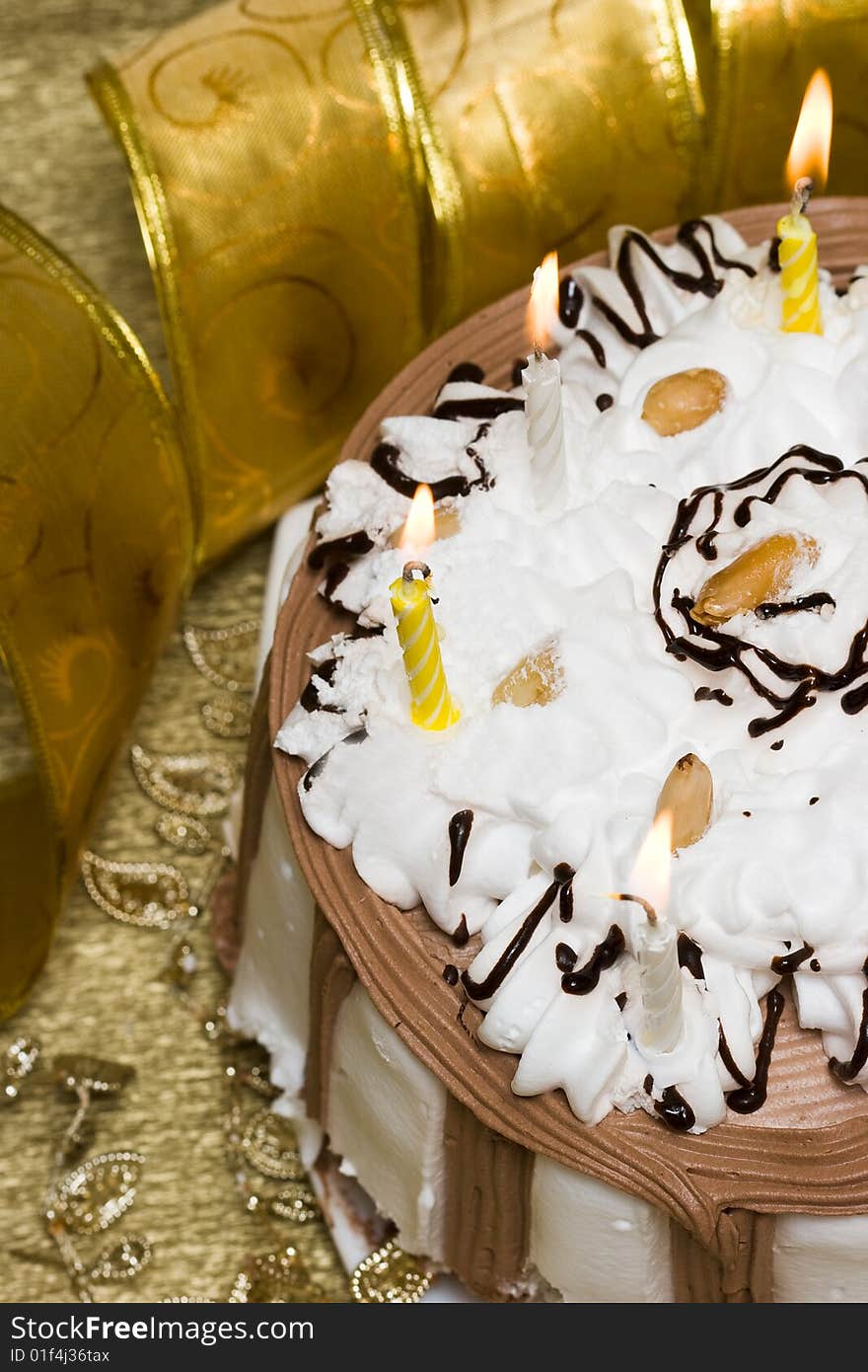 Cake and candles on celebratory table