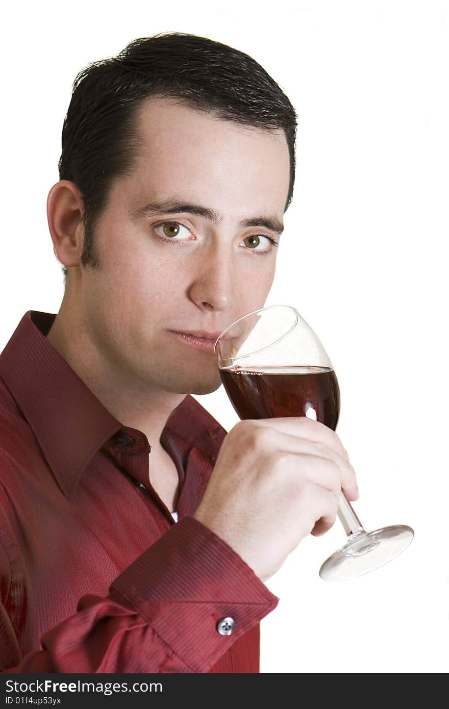 Young dark-haired man with red shirt and glass of red wine isolated on white background. Young dark-haired man with red shirt and glass of red wine isolated on white background.