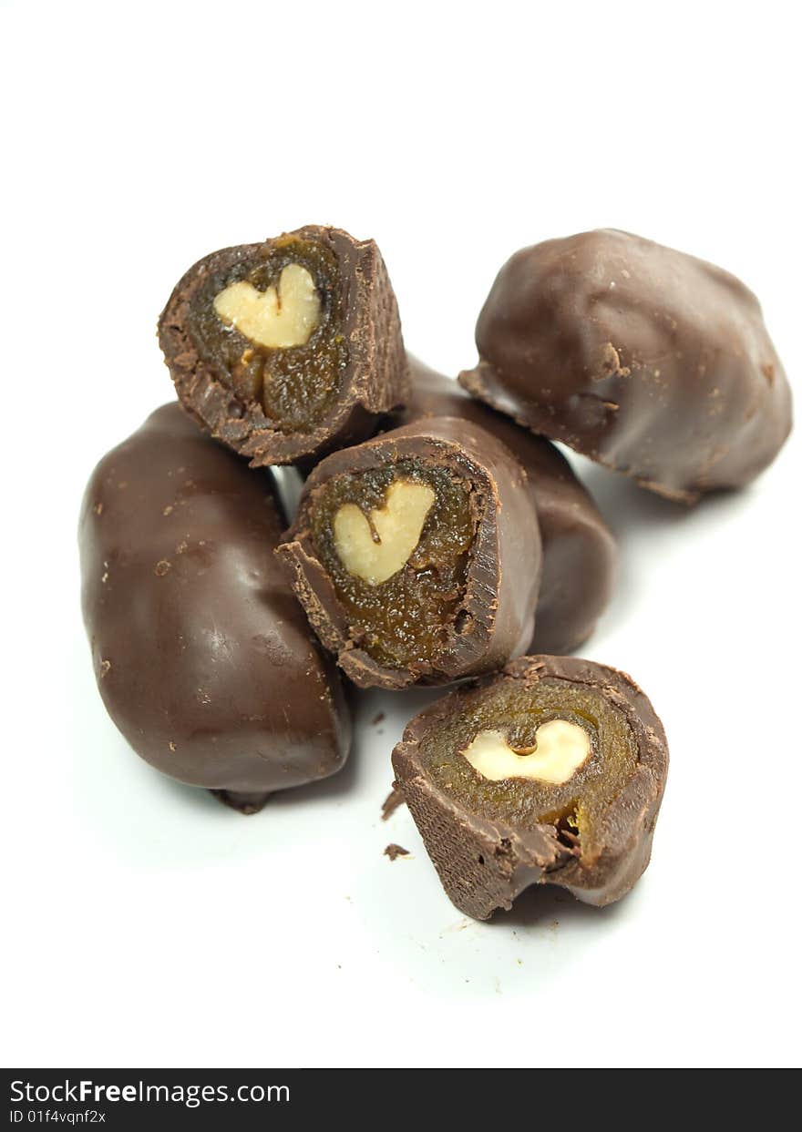 Chocolates with dried apricots and a walnut