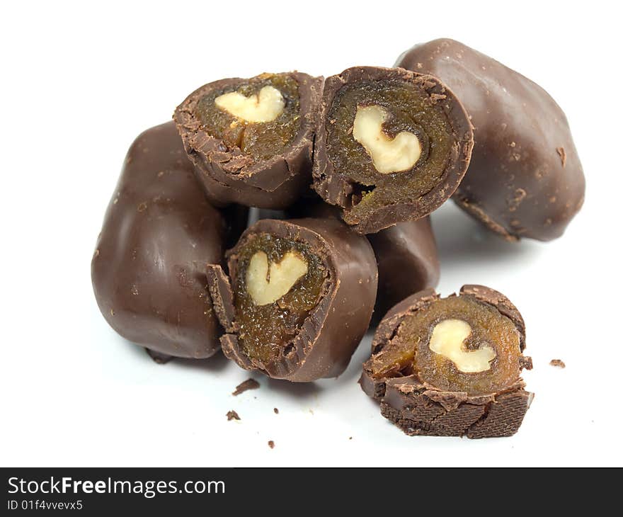 Chocolates with dried apricots and a walnut