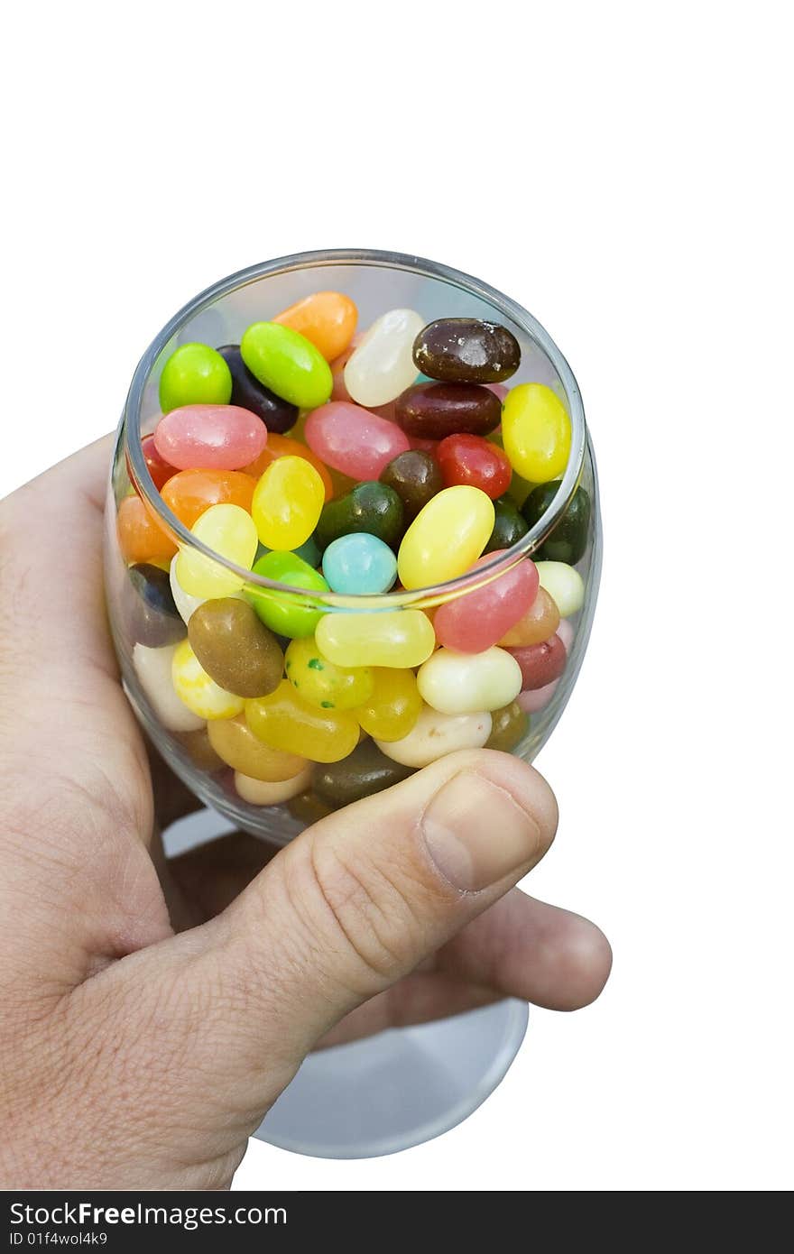 Here a glass full of jelly beans is being used as a metaphor for variety.  Alluring to the saying variety is the spice of life.  The beans are different colours and flavors.  Each one an adventure.  The names on the beans have been removed.