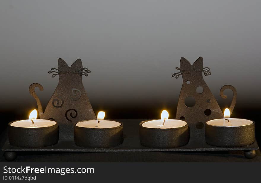 Candlestick with cats with four candle