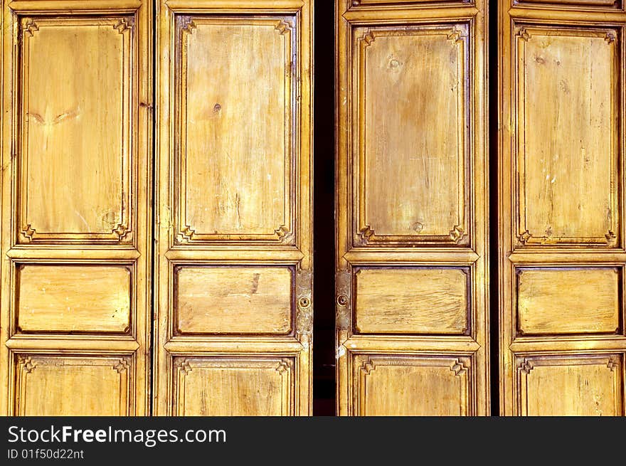 Wooden door in old style, shop entrance. China, Yunnan province, Lijiang - old town.