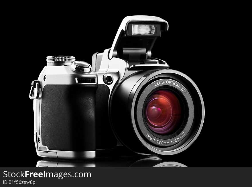 Photo camera isolated on black