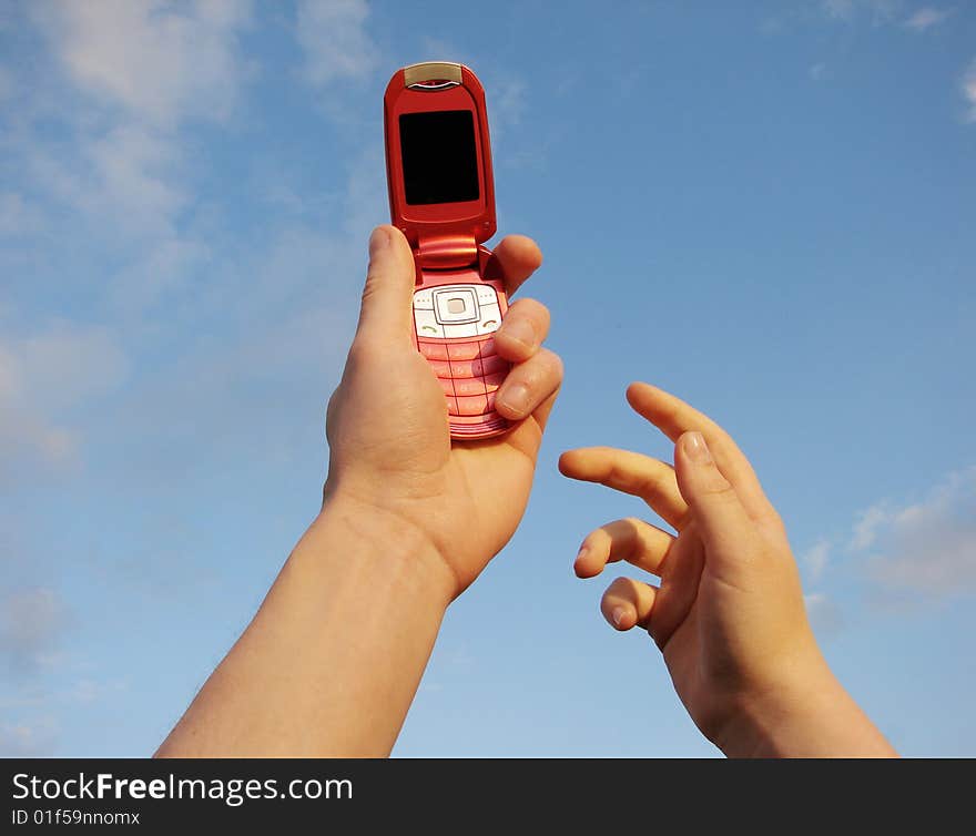 Hand holding a mobile phone for support