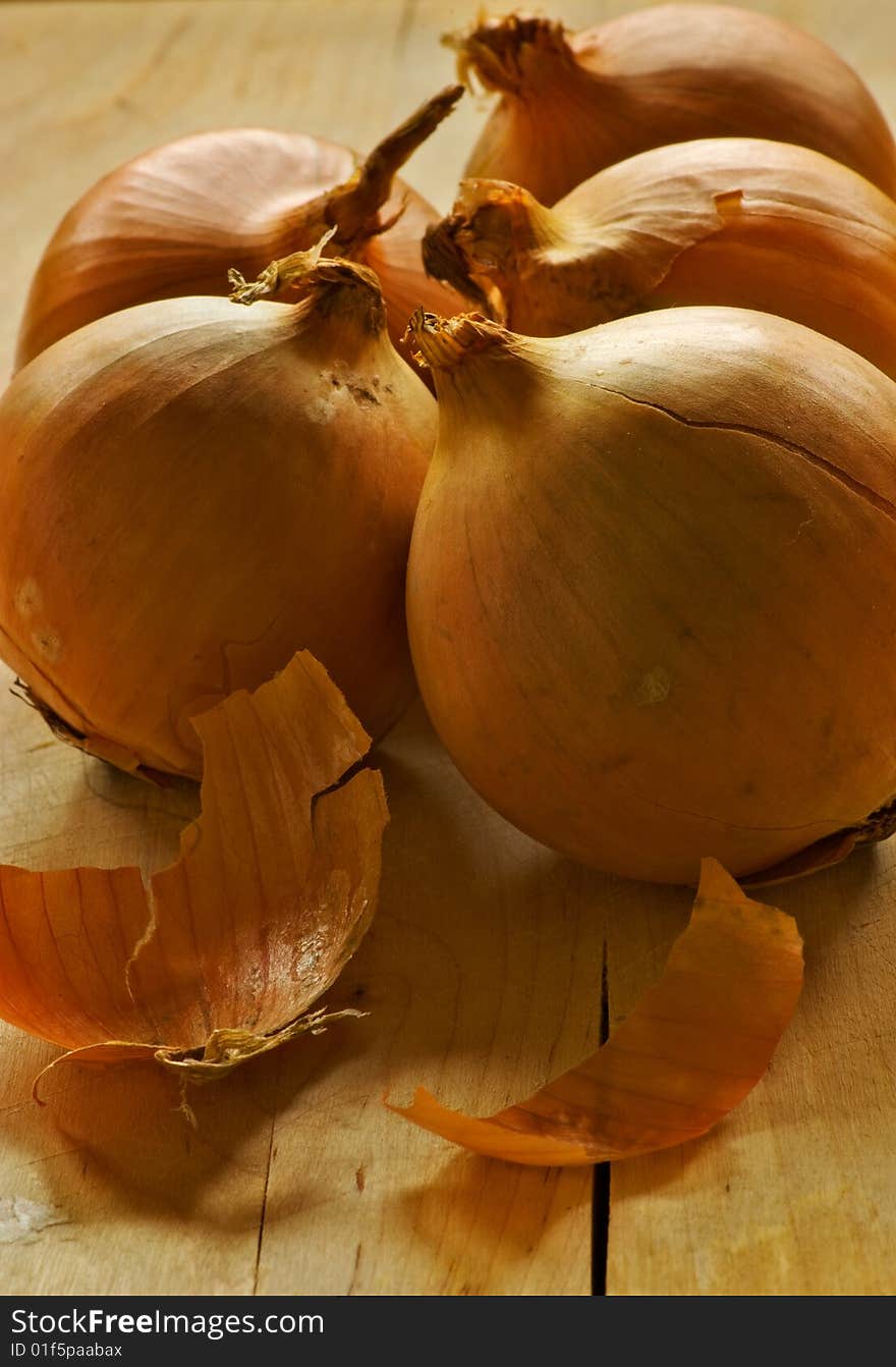 Five onion ready for chopping board