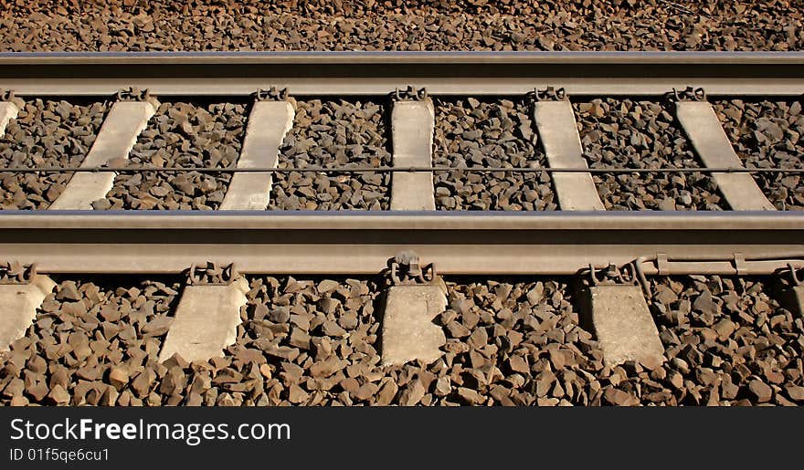 Brown Railroad tracks seen from the side