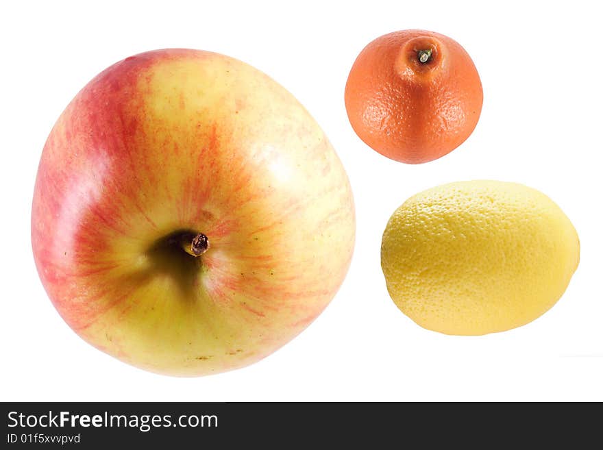 Apple, orange and lemon under the white background. Apple, orange and lemon under the white background