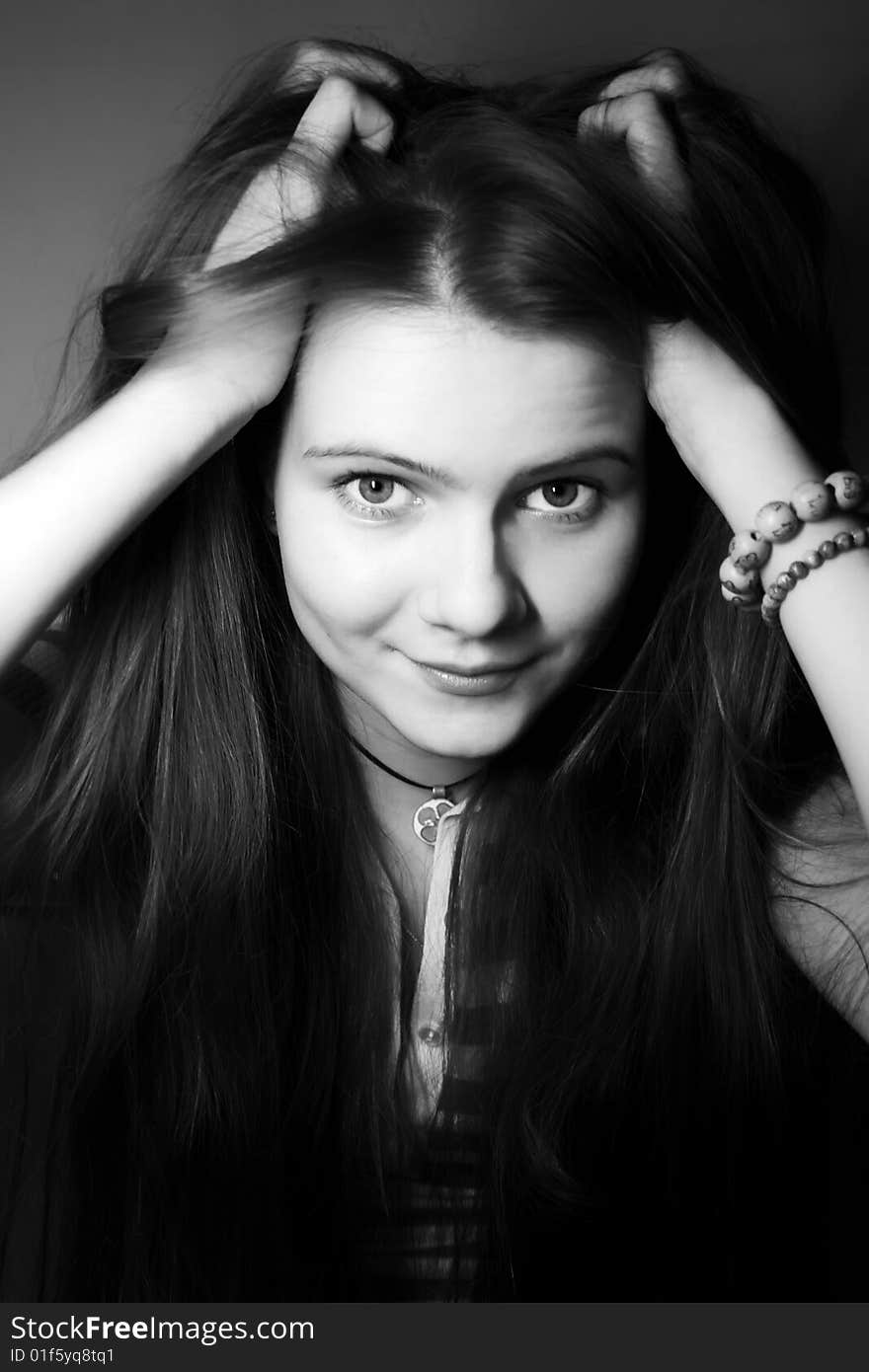 Beautiful young girl with long hair monochrome