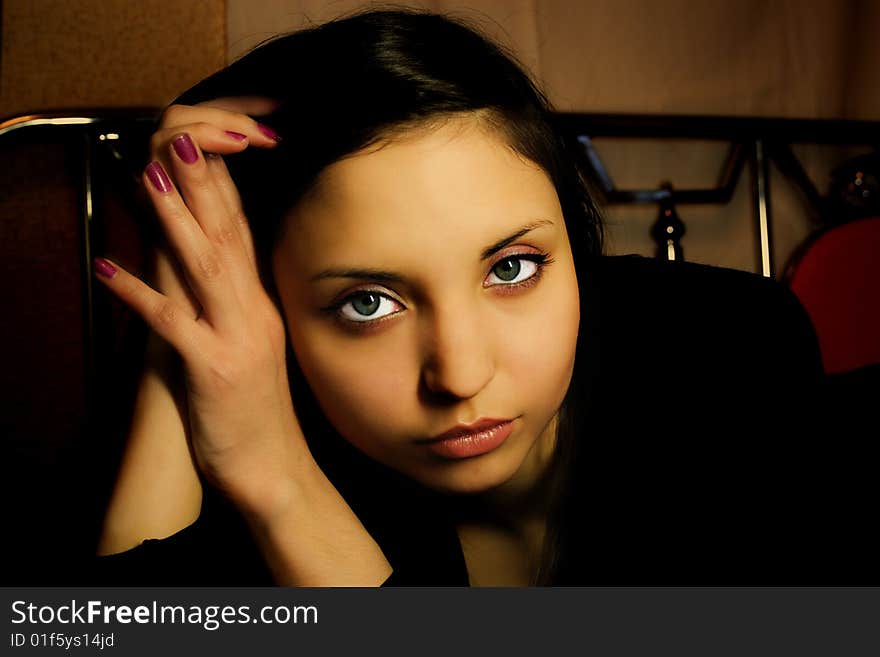 Portrait of a beautiful young woman close up