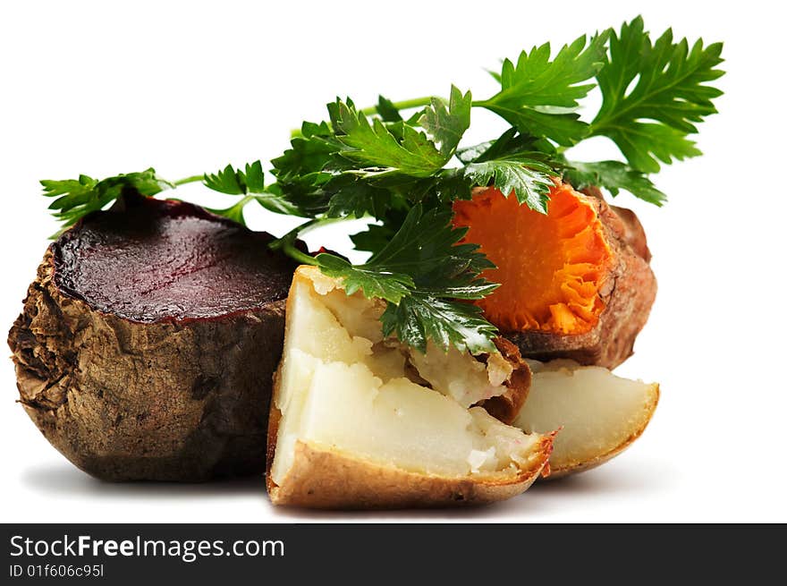 Grilled vegetables: potato, carrot, beet, and parsley isolated on a white background. Grilled vegetables: potato, carrot, beet, and parsley isolated on a white background