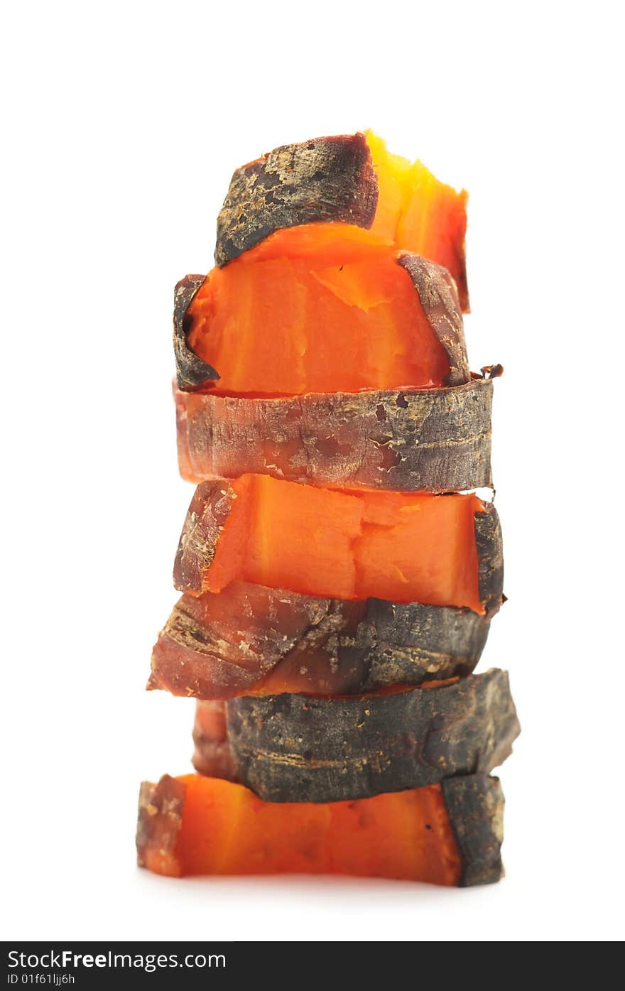 Pieces of grilled carrot in stack