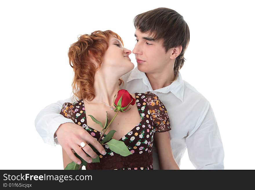 Couple young man and woman kissing on white background