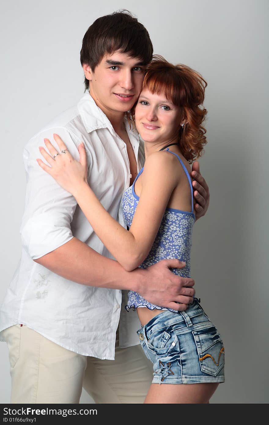 Couple young man and woman on white background