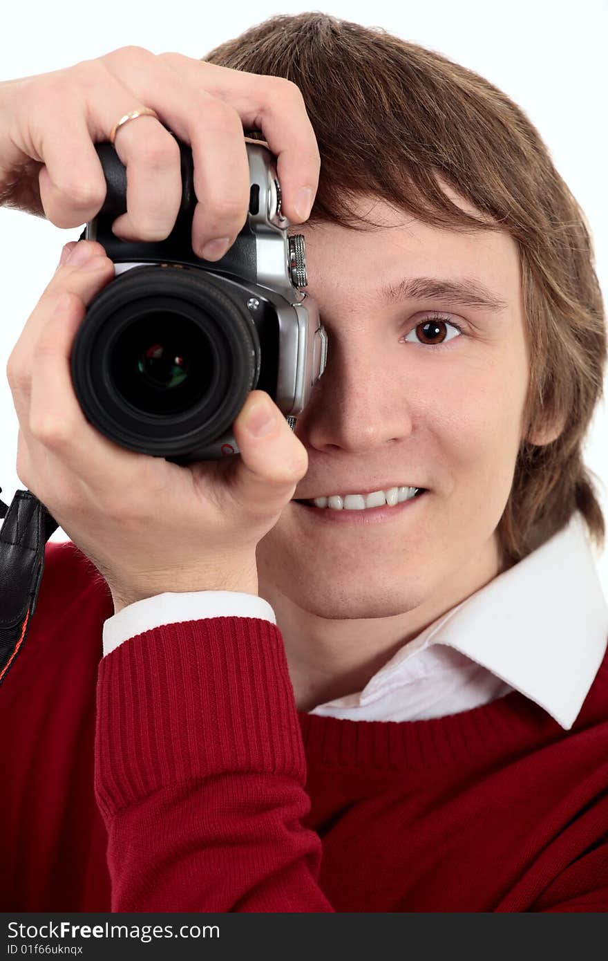 Young photographer man on white background