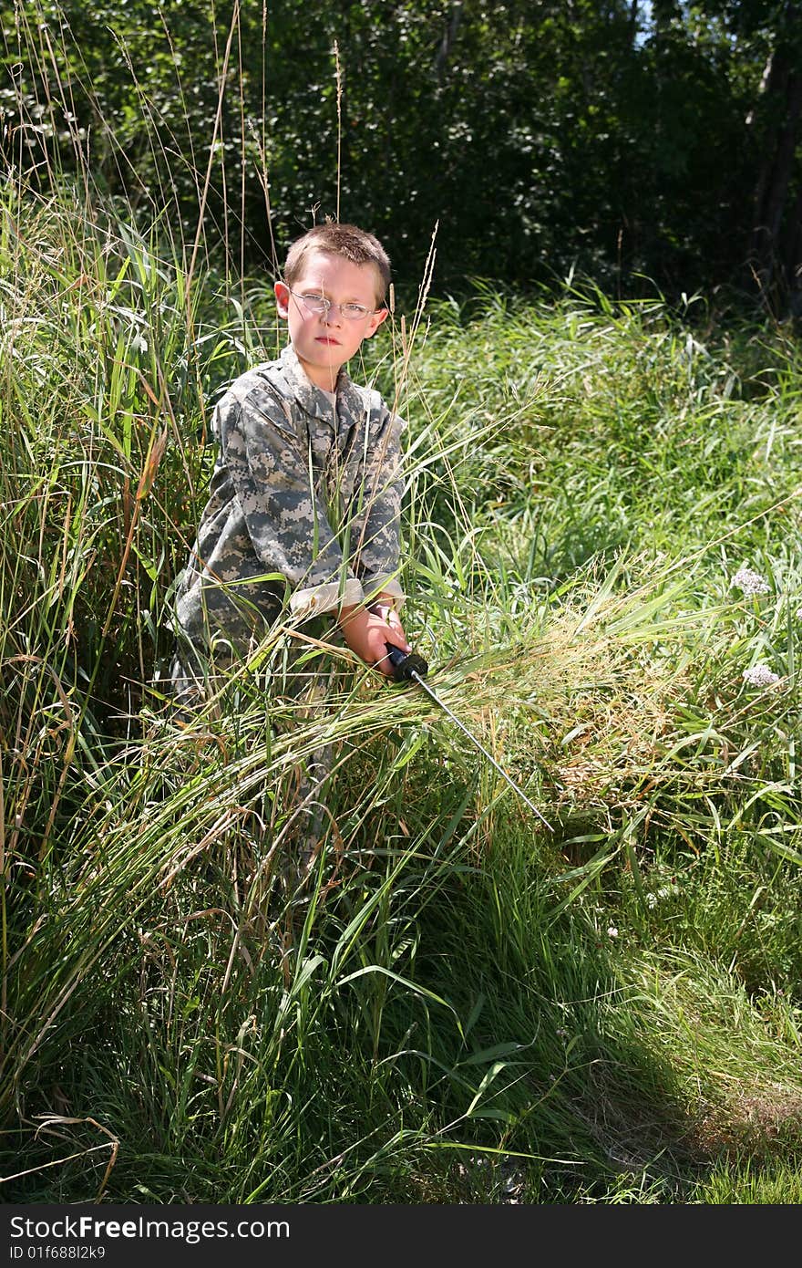 Boy in American Army camoflauge