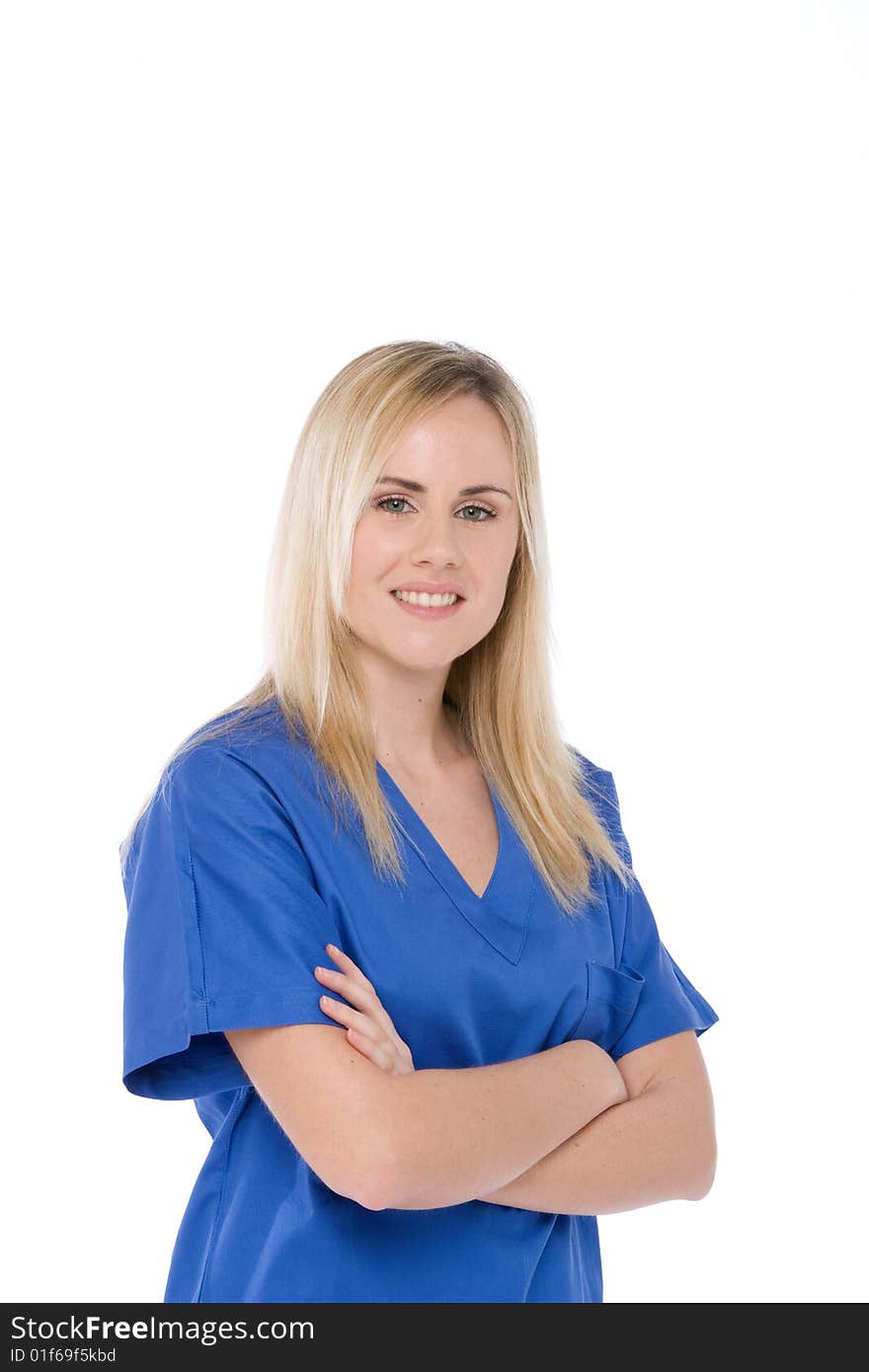 Studio shot of a nurse isolated on white with crossed arms. Studio shot of a nurse isolated on white with crossed arms