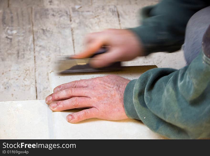 Planing plasterbord on a building site. Planing plasterbord on a building site