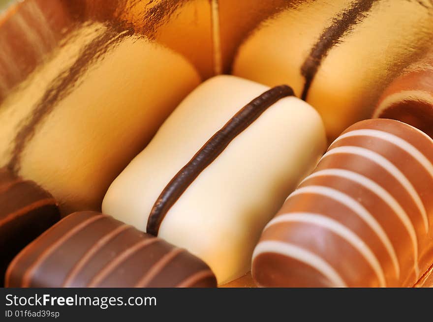 A collection of mixed chocolates in box