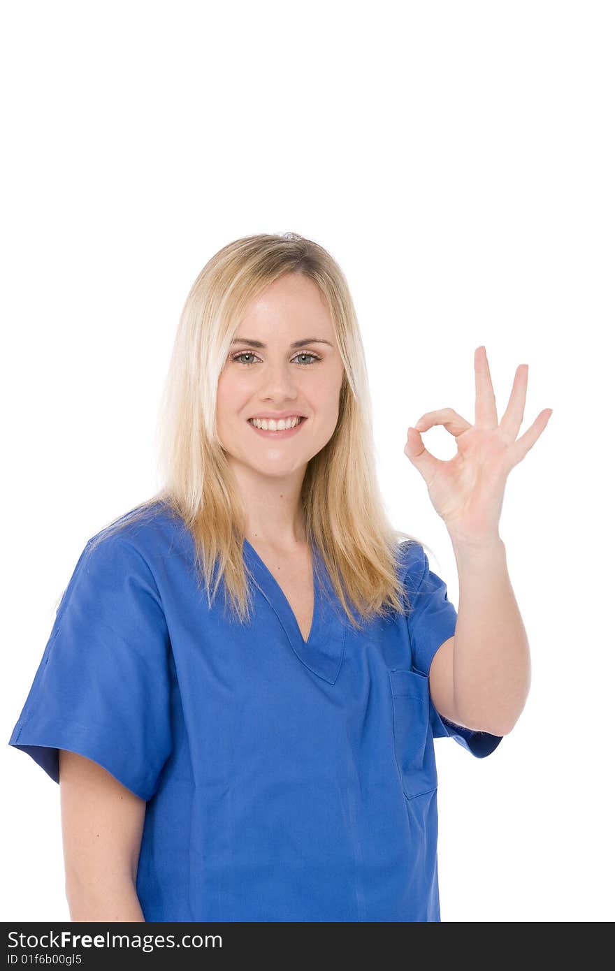 Studio shot of a nurse isolated on white making the ok sign. Studio shot of a nurse isolated on white making the ok sign