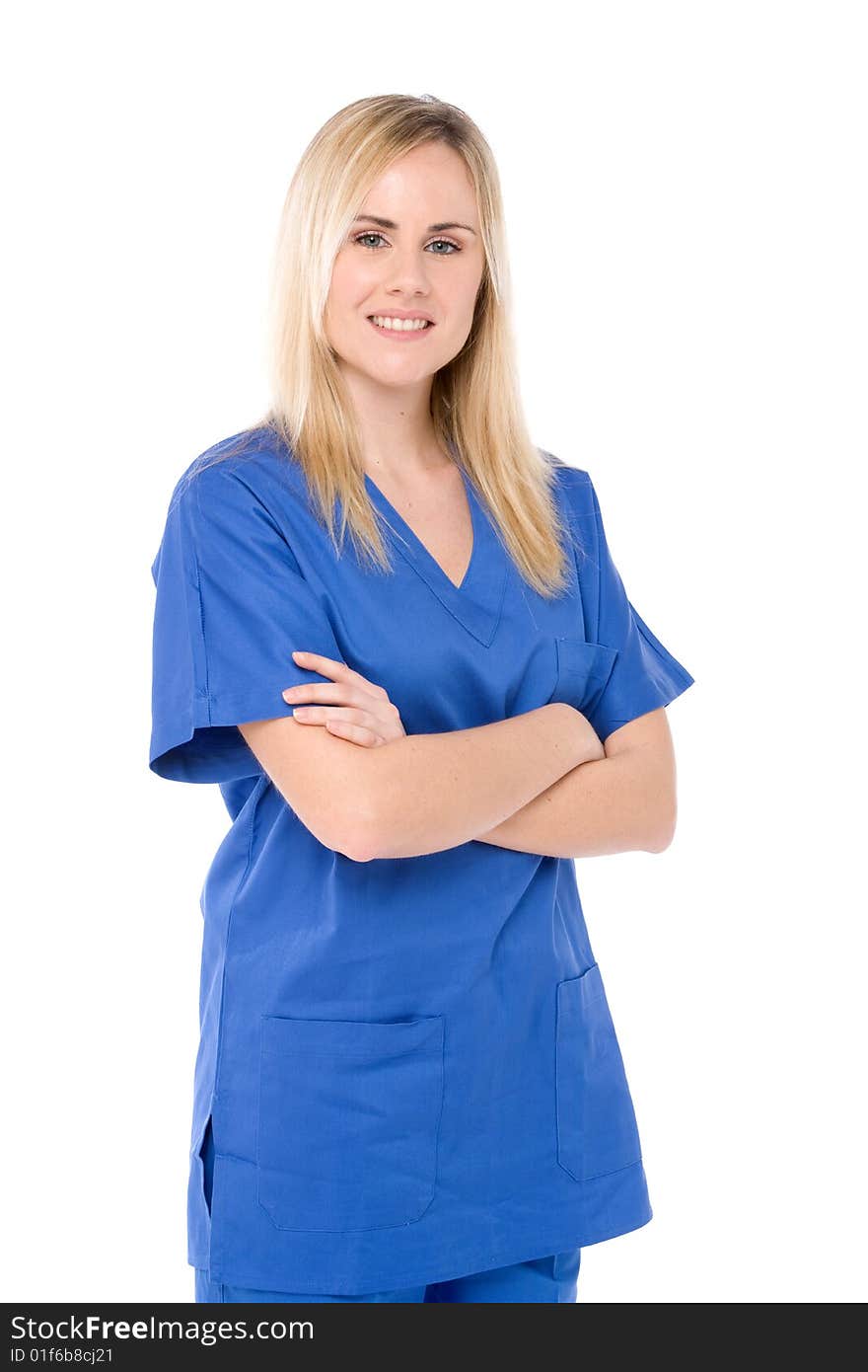 Studio shot of a nurse isolated on white with crossed arms. Studio shot of a nurse isolated on white with crossed arms