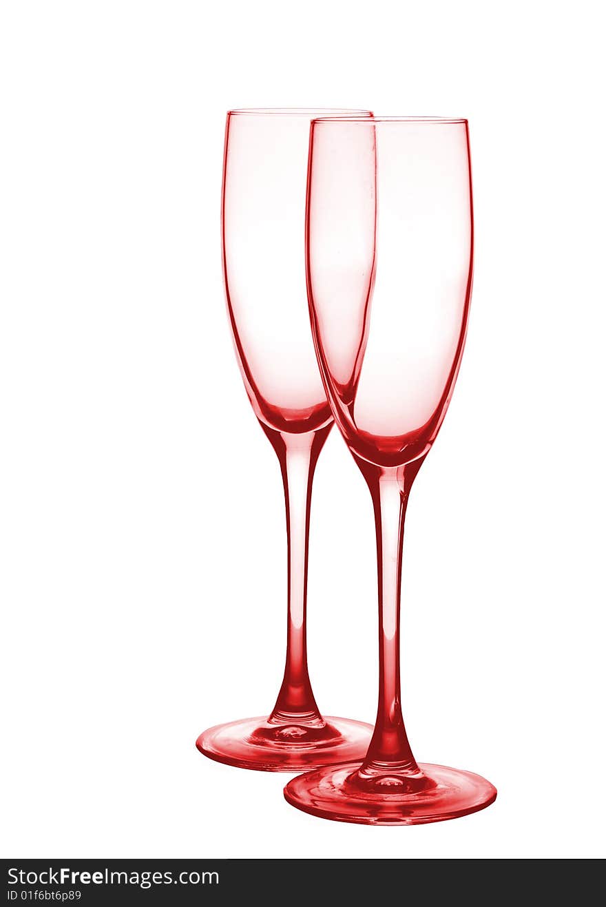 Two red glasses for champagne. On a white background.