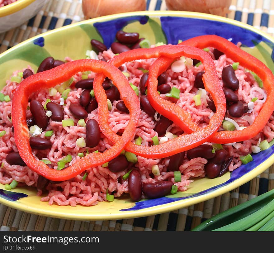 Some fresh mat with beans and onions. Some fresh mat with beans and onions