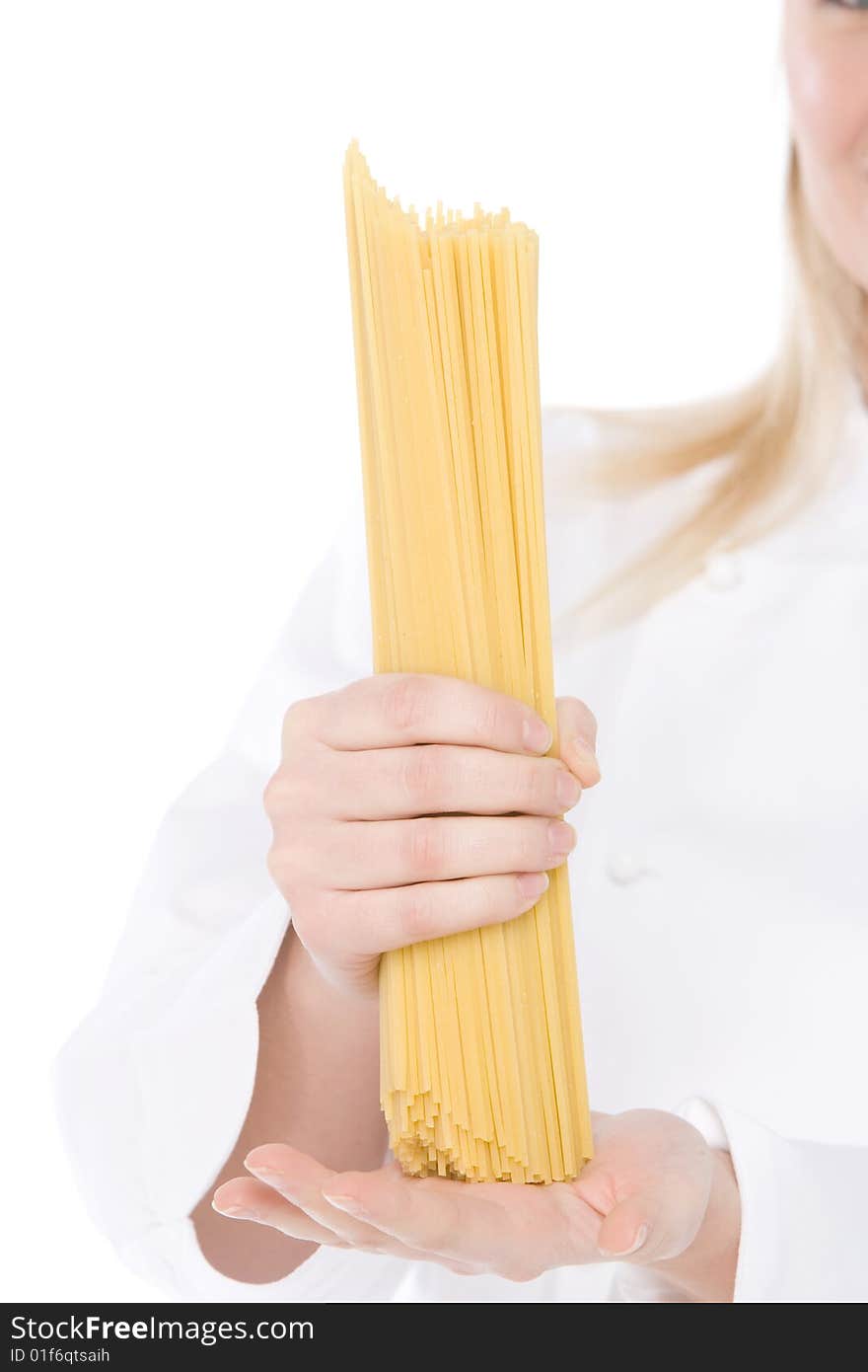 Close up of spaghetti in hand o a chef. Close up of spaghetti in hand o a chef