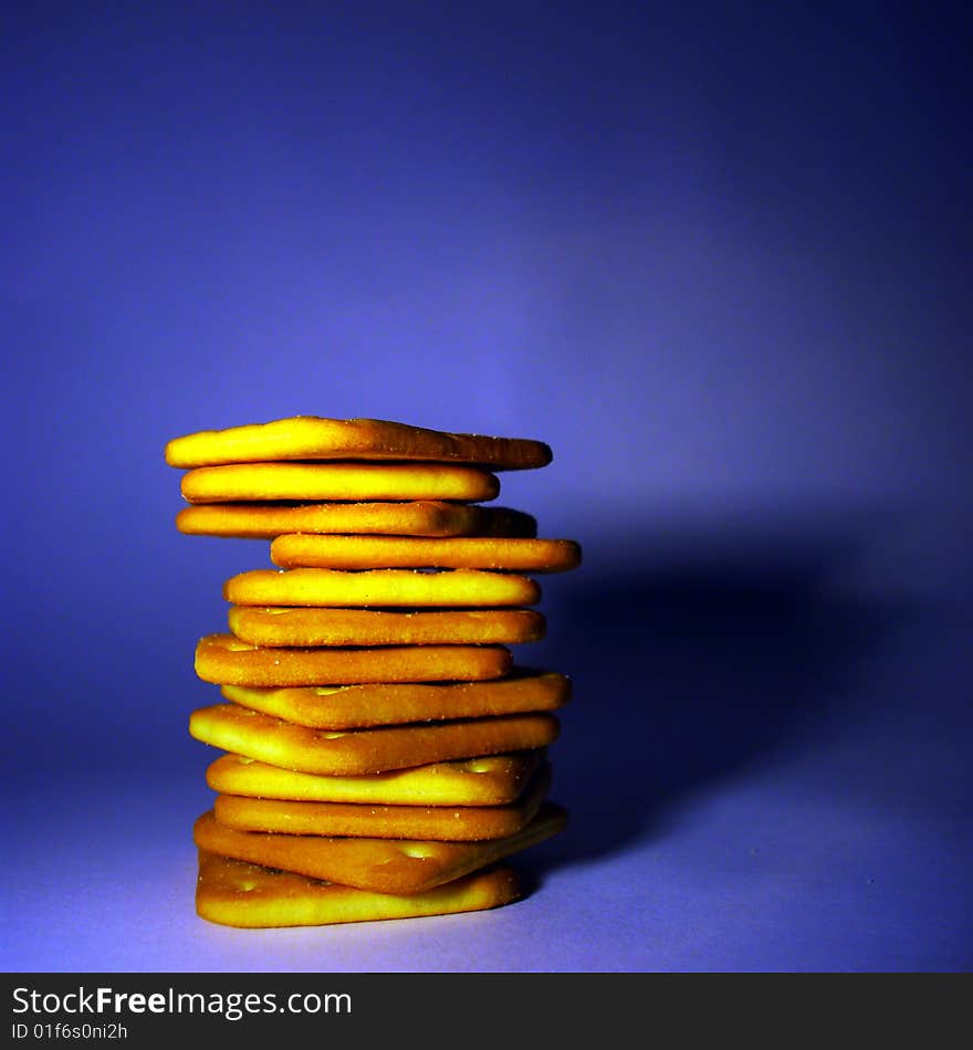 The Tower of crackers on a blue background