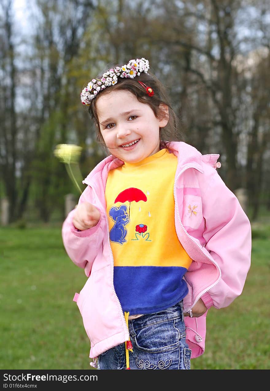 Little girl daisy-chain, spring lucky day, first flowers, girl brandish daisy. Little girl daisy-chain, spring lucky day, first flowers, girl brandish daisy