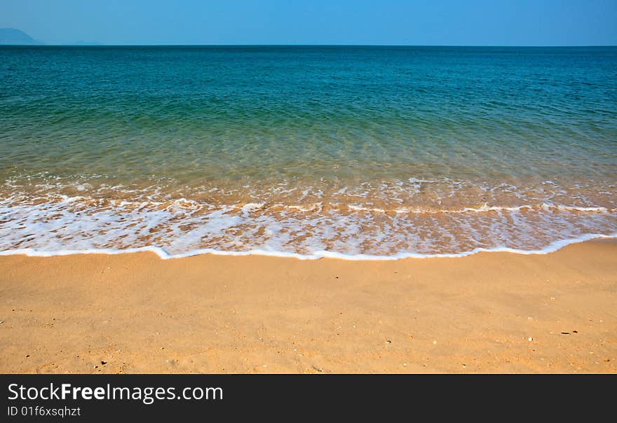 Sky, sea, golden sand, wave. Sky, sea, golden sand, wave