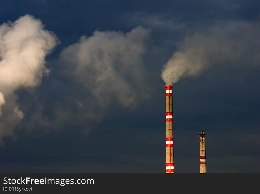 Exhaust and clouds of smoke in sky. Exhaust and clouds of smoke in sky