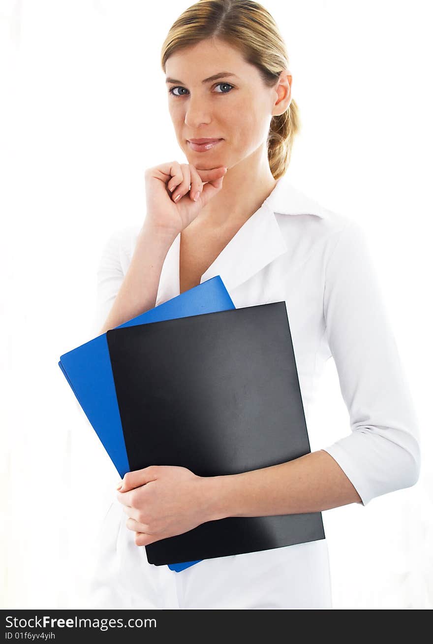 The beautiful businesswoman in a white jacket. The beautiful businesswoman in a white jacket