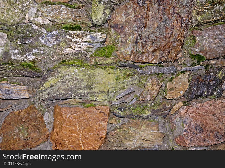 Old stone wall texture can be used as a background