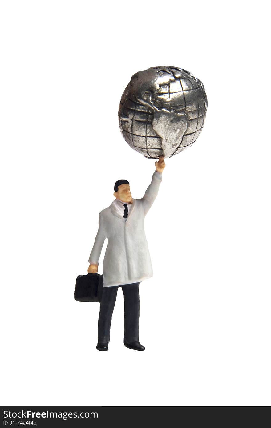 Business figurine holding an earth globe above his head. Business figurine holding an earth globe above his head