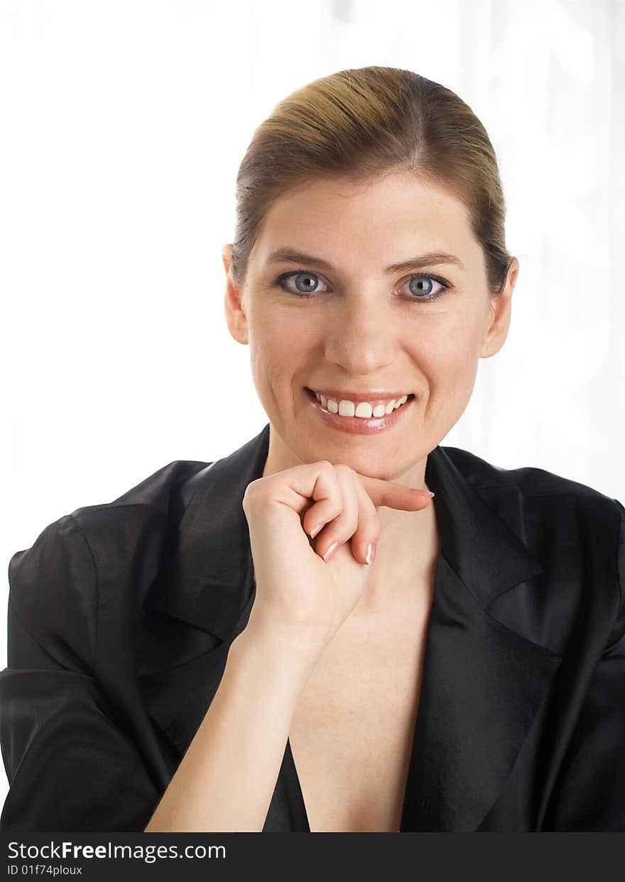 The beautiful businesswoman in a black jacket. The beautiful businesswoman in a black jacket