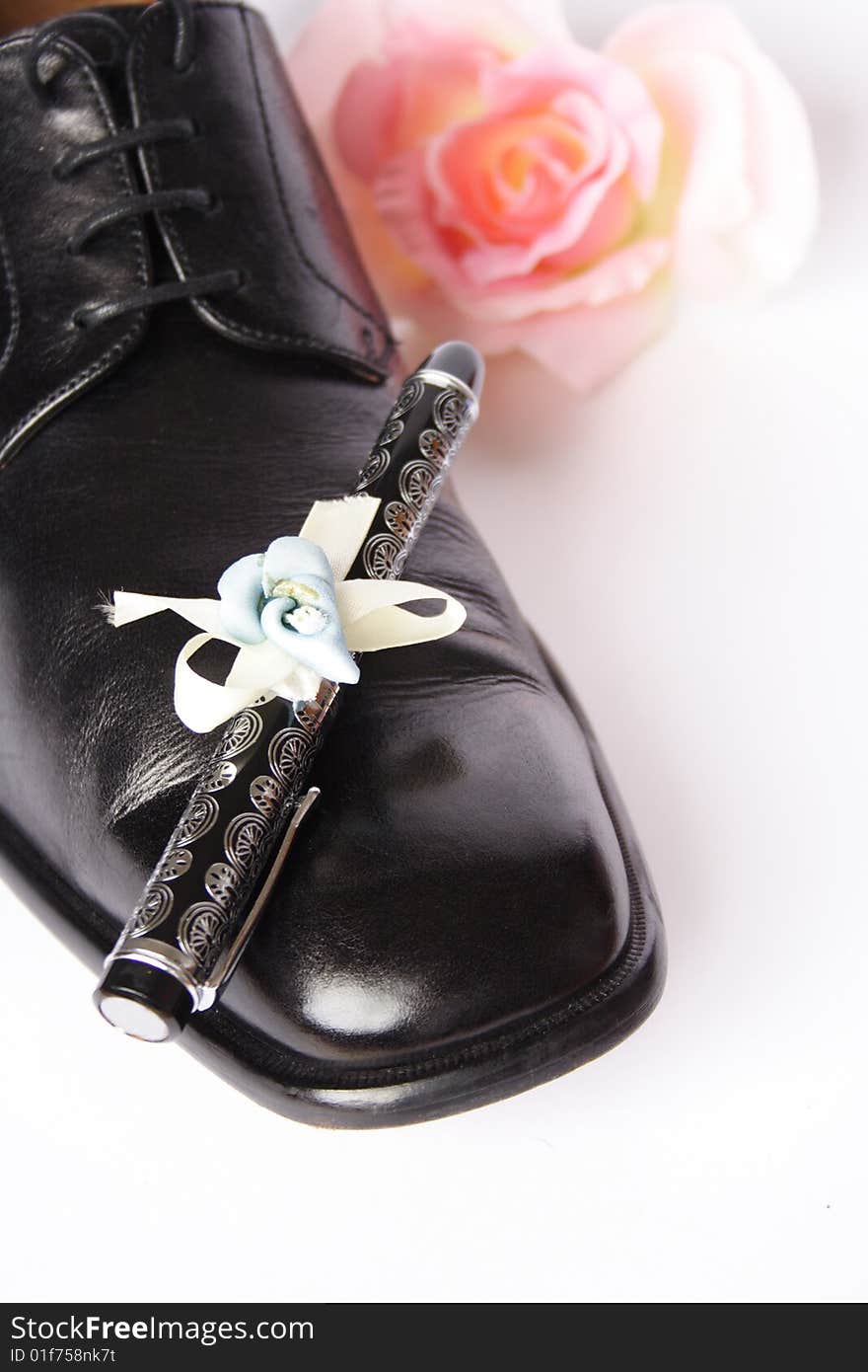 Pen on a shoe as present in Saint Valentine. Pen on a shoe as present in Saint Valentine