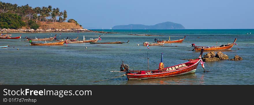 Boats on the sea, rock, Palms