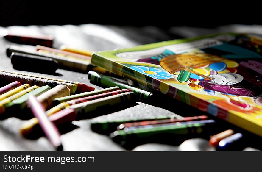 Book and pencil to draw with selective focus. Book and pencil to draw with selective focus