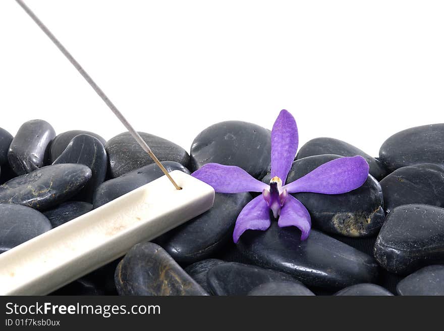 Stacked zen stones with flower. Stacked zen stones with flower