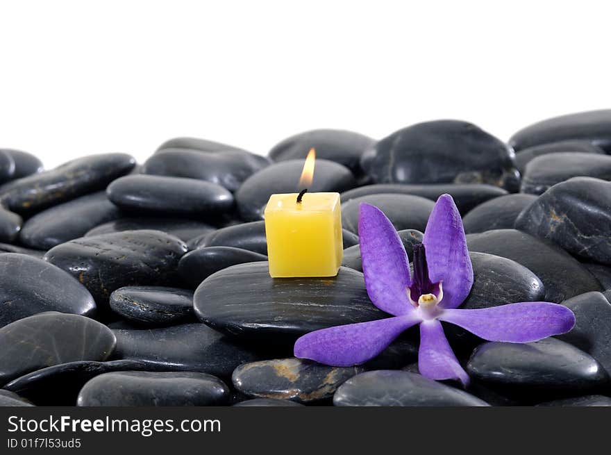 Stacked zen stones with flower. Stacked zen stones with flower