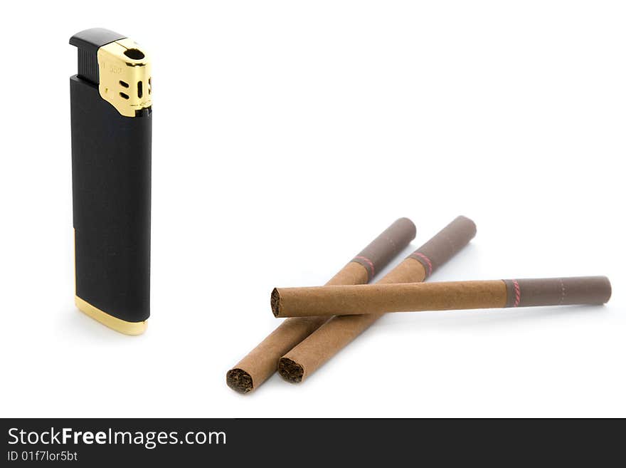 Stylish black pocket lighter and brown cigarettes