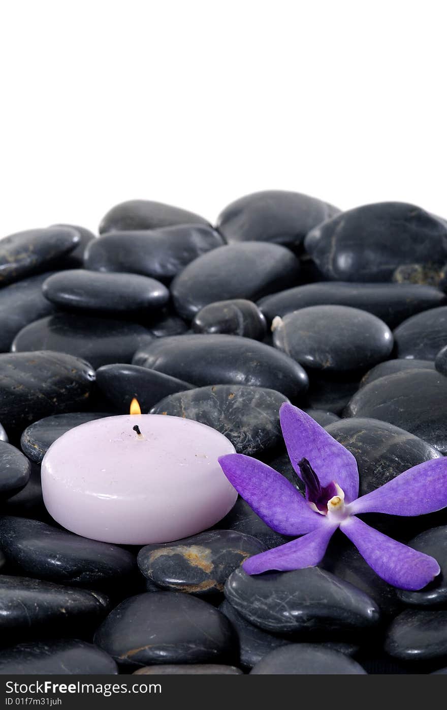 Stacked zen stones with flower. Stacked zen stones with flower