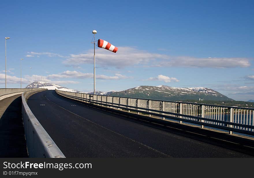 Bridge Road And Striped Windsock In Tromso, Norway