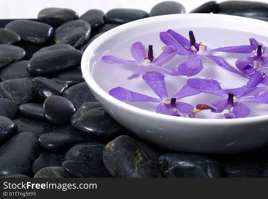 Stacked zen stones with flower. Stacked zen stones with flower