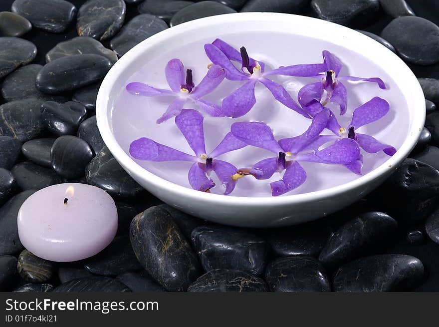 Stacked zen stones with flower. Stacked zen stones with flower