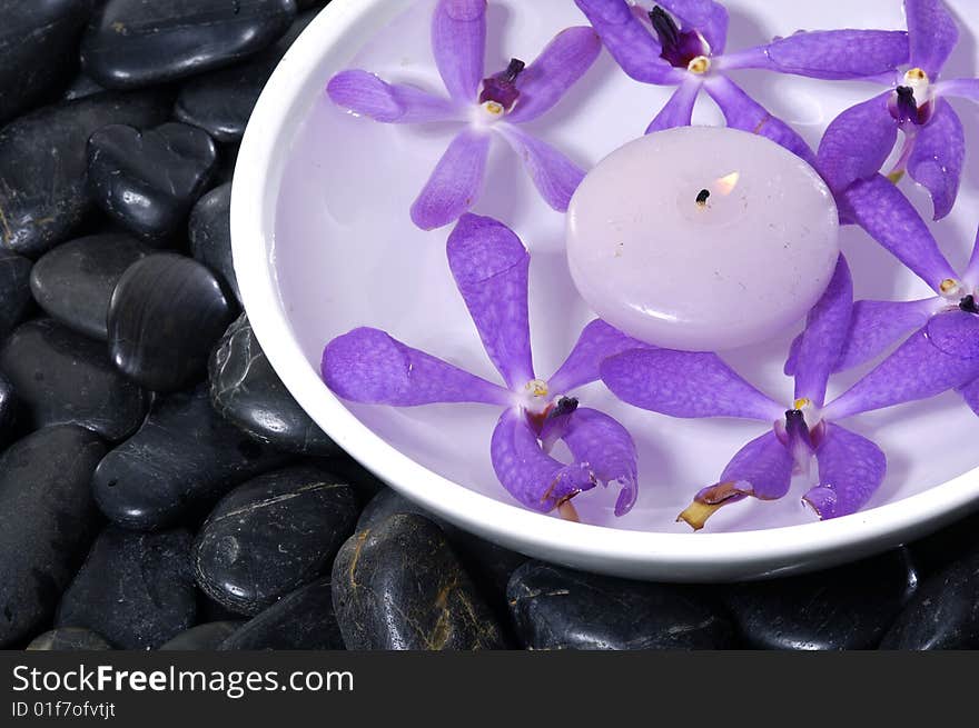 Stacked zen stones with flower. Stacked zen stones with flower